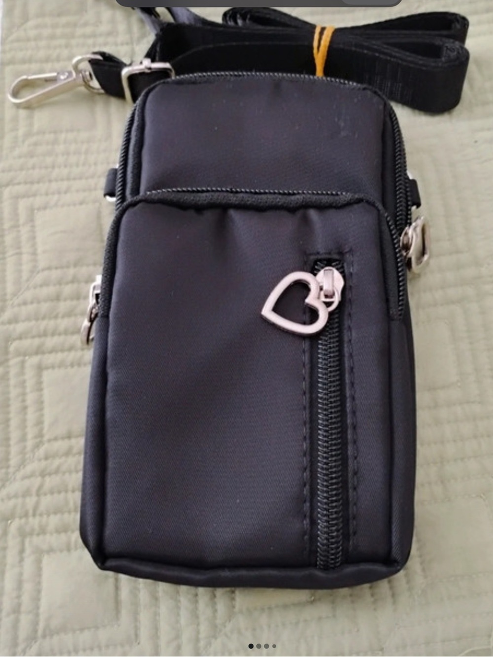 “New With Tags”. Black Crossbody Wallet/Phone Holder With Strap.  (7” X 4”)
